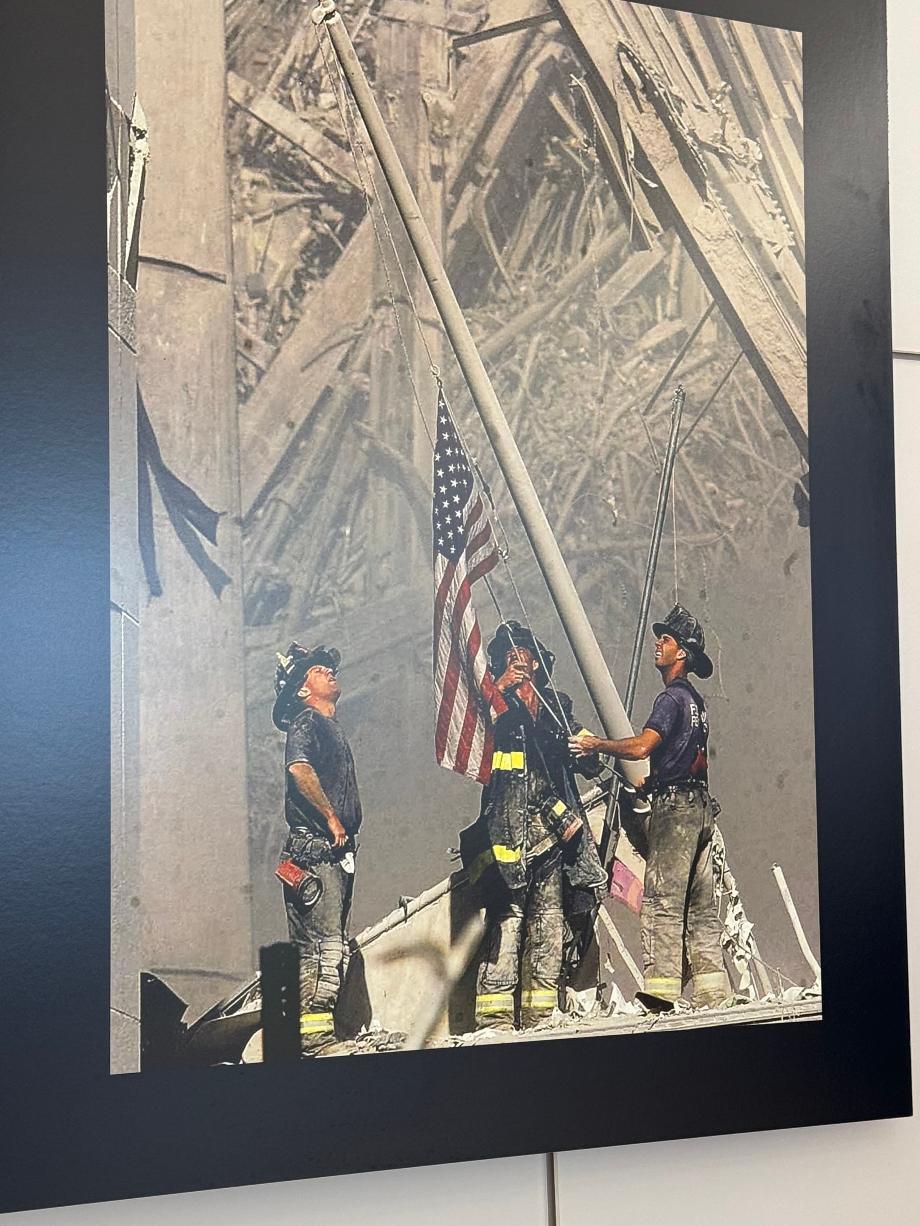 First responders raising the flag